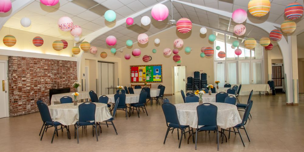 fellowship hall decorated with balloons